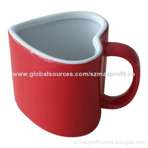 Stoneware red heart-shaped mug